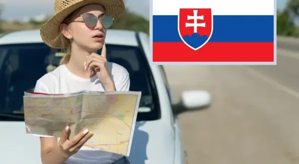 Dziewczyna z mapą przy aucie, zastanawia się, co trzeba mieć w aucie na Słowacji. Flaga Słowacji.